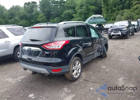 2016 Ford Escape Titanium z USA, uszkodzony, nr VIN 1FMCU9J95GUB27571